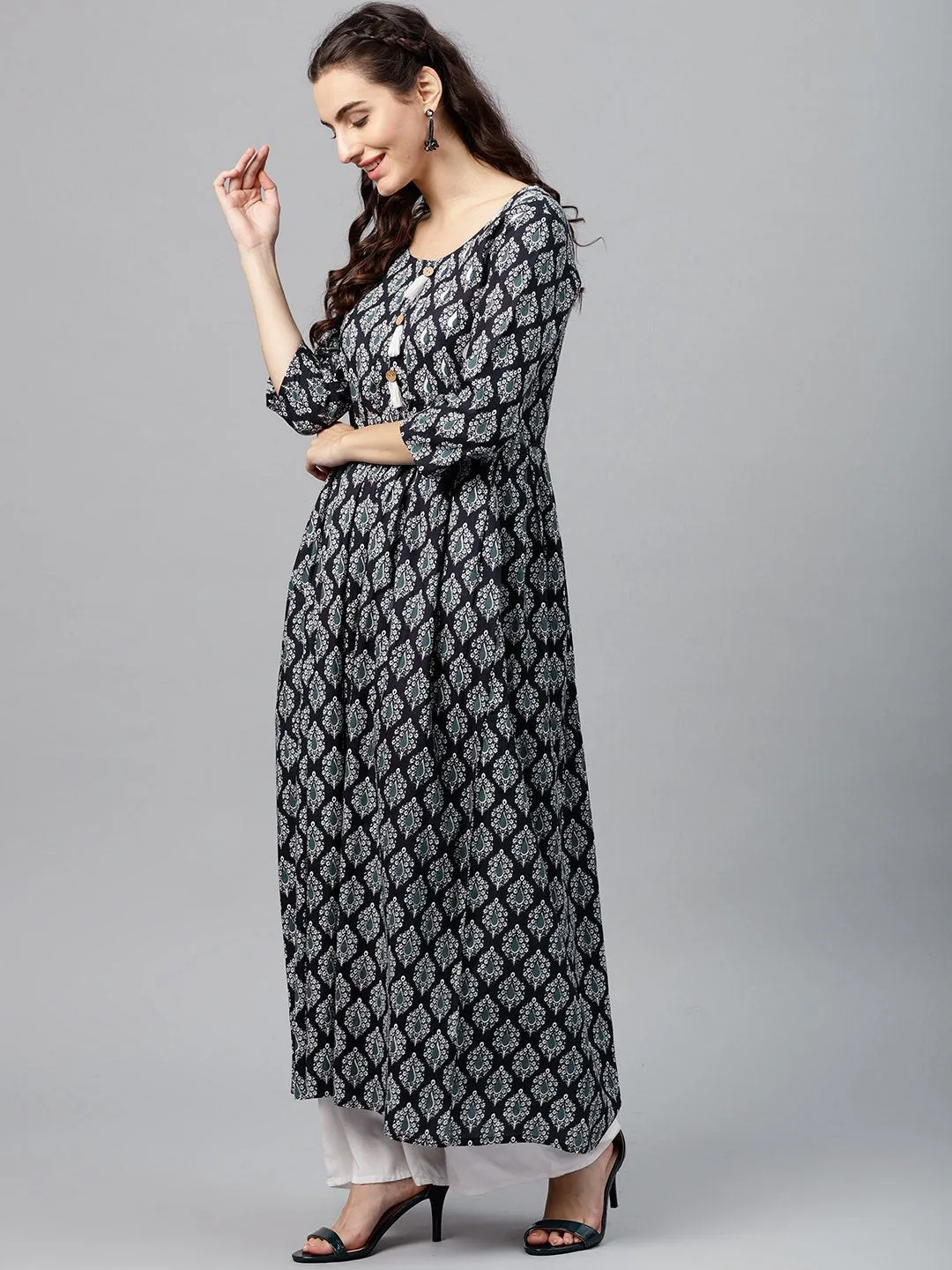 Round Neck Black & White Printed Maxi Dress With 3/4 Sleeves And Emblished With Tassels