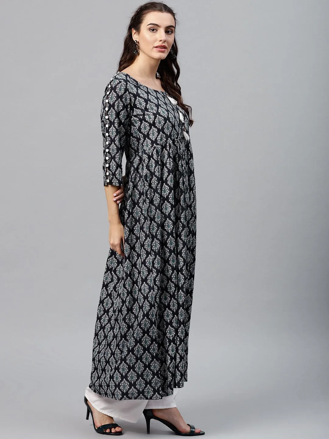 Round Neck Black & White Printed Maxi Dress With 3/4 Sleeves And Emblished With Tassels